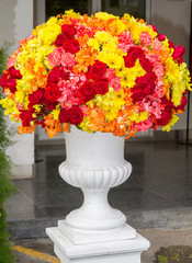 Large flower vase is based on white cement.