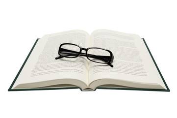Folded Eyeglasses On Opened Book Isolated On White