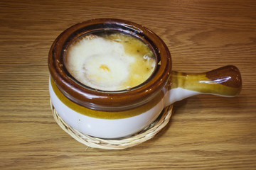 French Onion Soup with melted Mozzarella Cheese