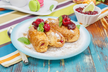 Breakfast.  Pastry with raspberry filling
