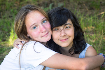 Obraz premium Two young girl in the park having good time.