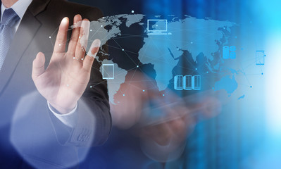 Businessman working with a Cloud Computing diagram on the new co