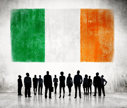 Silhouettes of Business People with Flag of Ireland
