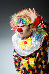Funny clown in the studio