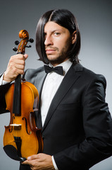 Man violin player in musican concept © Elnur