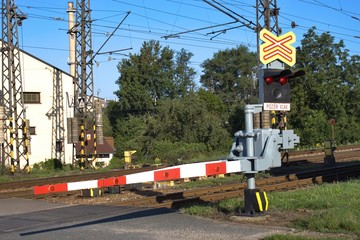 railroad crossing with a barrier