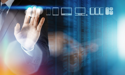 Businessman working with a Cloud Computing diagram on the new co