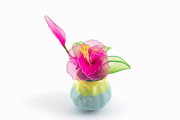 Colorful decoration artificial flower in vase.