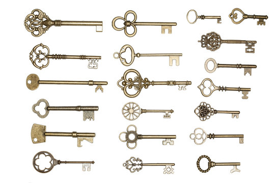 Golden keys isolated on white