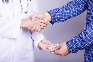 Händeschütteln Arzt Geld