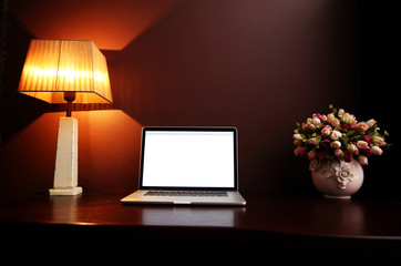 Closeup image of a workplace at home with laptop