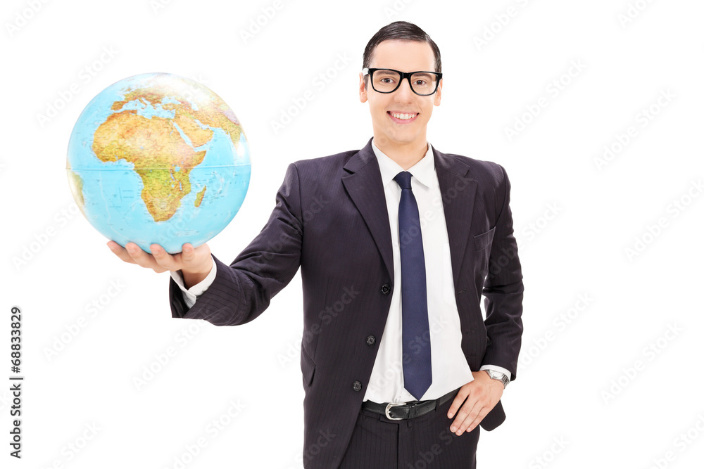 Poster Happy young businessman holding a globe