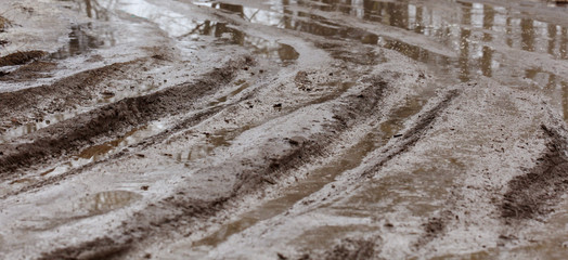 Dirty wet road, off-road clay