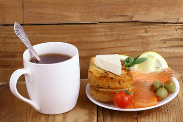 Breakfast tea sandwich with salmon