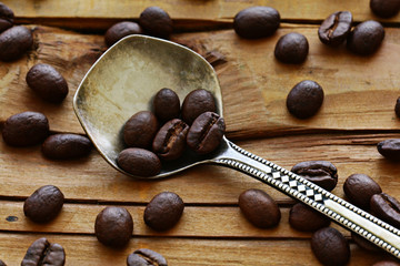 wooden background coffee grains