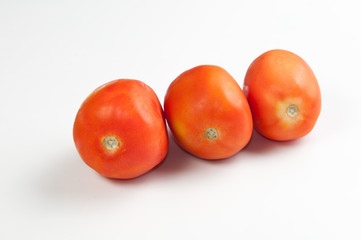 Three fresh tomatoes