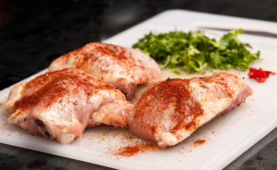 Raw chicken, with spices, ready for cooking