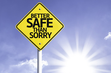 Better Safe Than Sorry road sign with sun background
