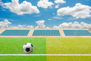 Soccer ball on green stadium