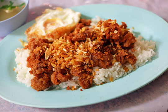 Asian fritter pork with rice and soup