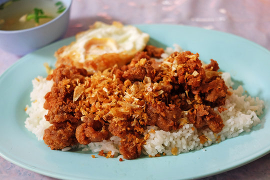 Asian fritter pork with rice and soup