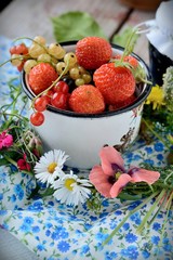 Mug with fresh berries