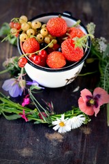 Mug with fresh berries