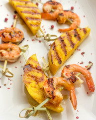 skewers of shrimp and mango
