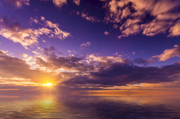 light vivid sunser with pretty clouds at sunset