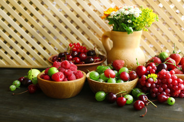 Still life with berries and flowers