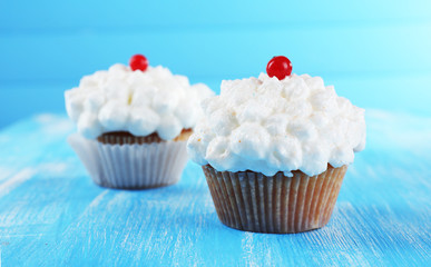 Tasty cupcake on table, close up