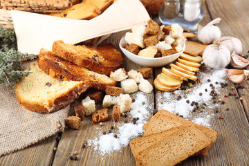 Homemade croutons on table in kitchen, close up