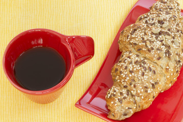 Coffee and whole wheat croissant