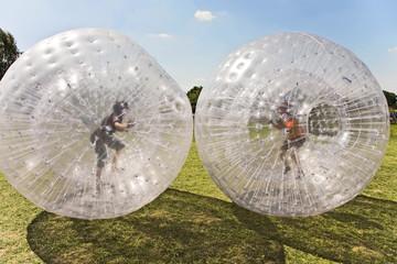 children have a lot of fun in the Zorbing Ball