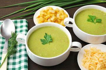 Leek soup on table, close up