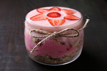Healthy breakfast - yogurt with  strawberries and muesli served