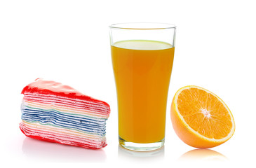 crepe, fresh orange and glass with juice