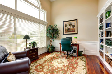Office room interior in luxury house with high ceiling