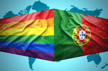 Waving Portuguese and Gay flags