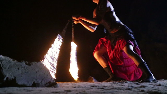 Artist turns the fiery fire-snakes fire performance