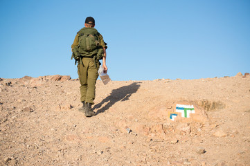 Soldiers patrol in desert