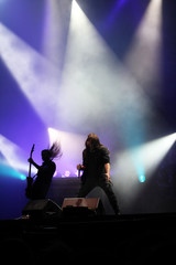 Guitarist and singer on the stage rock heavy metal concert