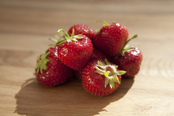 Fresh strawberries on wooden table