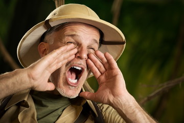 Adventurer shouting in the jungle