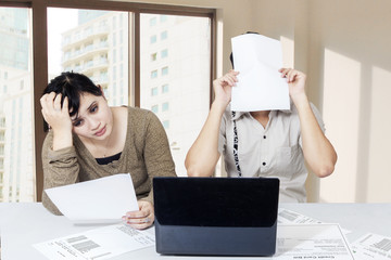 Stressful couple get many bill