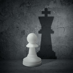 White chess pawn with shadow queen
