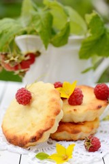 small cheesecakes with raspberry in the country