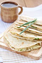 Flatbread with mashed potato and spring onion