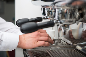 Barista doing your coffee