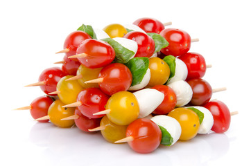Composition of cherry tomatoes and mozzarella on skewers
